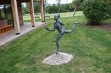 messenger with bird by Janis Ridley, Sculpture, Bronze