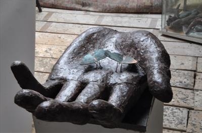 Hand and Butterflies by Janis Ridley, Sculpture, Bronze